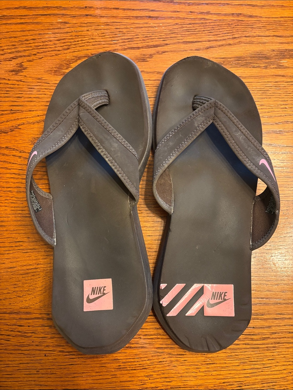 Nike Brown Flip-Flop Sandals with Pink Logo